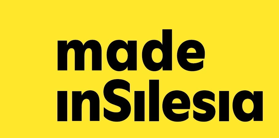 Czarny napis "made in Silesia" na żółtym tle.